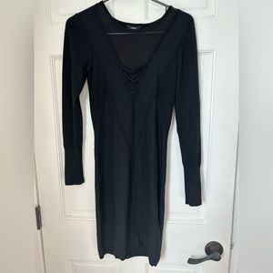 GUESS black knit dress with sheer top. Super flattering. Lightly worn.